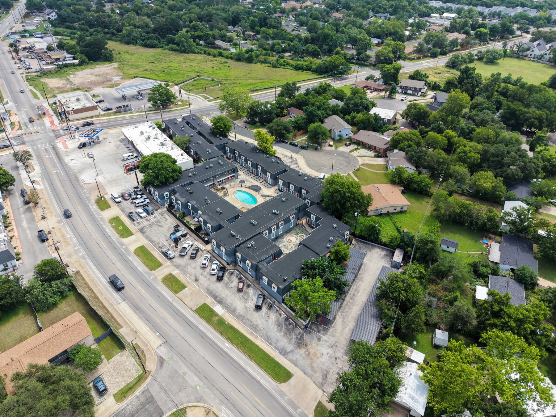 Aerial view of Mueller Square near the central Austin skyline