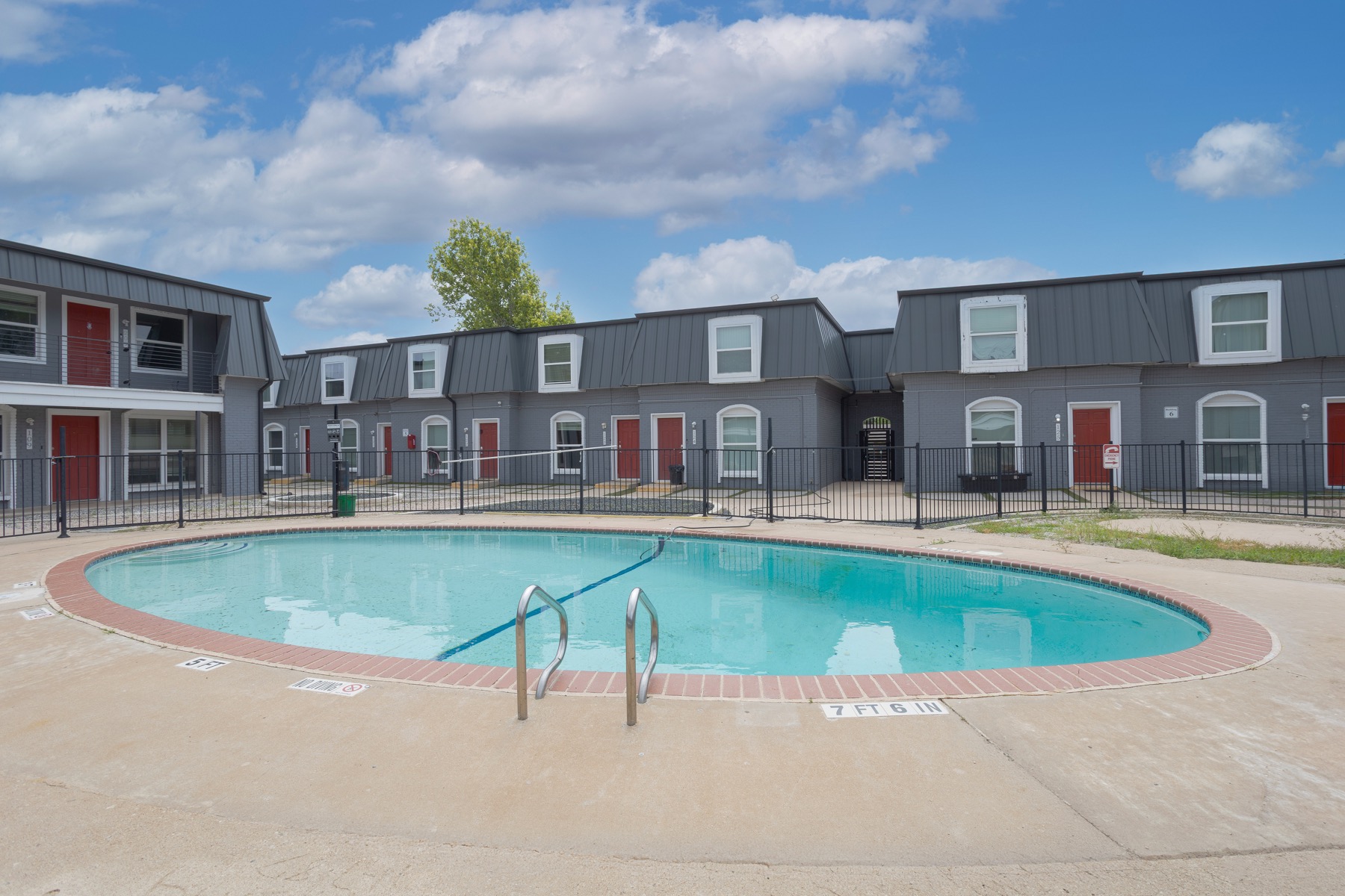Mueller Square pool courtyard and apartment exterior